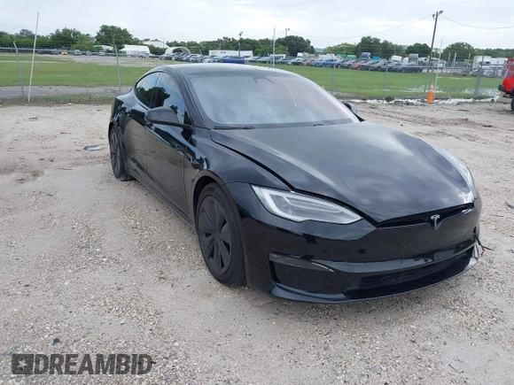 2022 Tesla Model S with VIN 5YJSA1E51NF472152, listed as a IAAI auction lot 42625943 with 60,290 mi miles and . Bid and sale history available at DreamBid. Image 1.