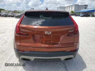2019 Cadillac XT4 FWD Premium Luxury with VIN 1GYFZCR41KF183507, listed as a Copart auction lot 61581215 with 64,803 mi miles and Salvage title. Bid and sale history available at DreamBid. Image 6.