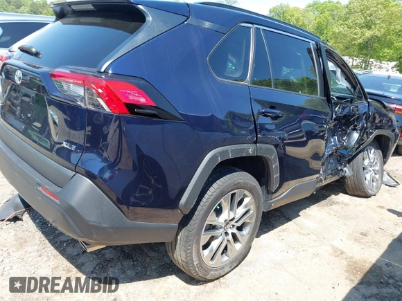 2022 Toyota RAV4 XLE Premium with VIN 2T3C1RFVXNW231752, listed as a IAAI auction lot 42072442 with 7,262 mi miles and . Bid and sale history available at DreamBid. Image 4.