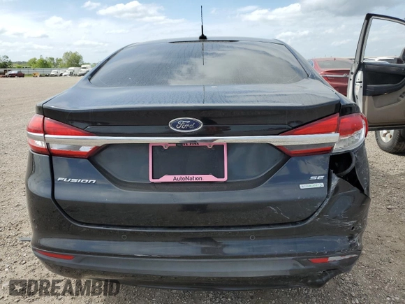 2018 Ford Fusion SE z VIN 3FA6P0HD8JR217719, wystawiony jako Copart lot #53429555 z przebiegiem 108 953 mil mil oraz Szkoda całkowita • Salvage title. Historia ofert i sprzedaży dostępna na DreamBid. Obrazek 6.