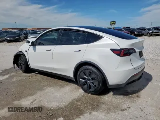 2024 Tesla Model Y Long Range z VIN 7SAYGDEE0RA313929, wystawiony jako Copart lot #59548725 z przebiegiem Nie podano mil oraz Szkoda całkowita • Salvage title. Historia ofert i sprzedaży dostępna na DreamBid. Obrazek 2.