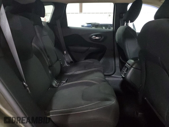 2015 Jeep Cherokee Latitude z VIN 1C4PJMCS9FW551890, wystawiony jako Copart lot #60148795 z przebiegiem 129 928 mil mil oraz Szkoda całkowita • Salvage title. Historia ofert i sprzedaży dostępna na DreamBid. Obrazek 11.
