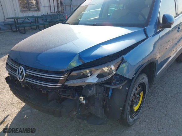 2017 Volkswagen Tiguan Wolfsburg Edition with VIN WVGRV7AX0HW502041, listed as a IAAI auction lot 31232130 with 30,214 mi miles. Bid and sale history available at carsss.com. Image 6.