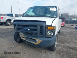 2013 Ford Econoline Cargo Commercial with VIN 1FTNE1EW4DDA09857, listed as a IAAI auction lot 41889302 with 131,059 mi miles and . Bid and sale history available at DreamBid. Image 6.