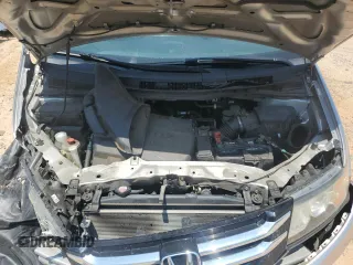 2014 Honda Odyssey EX-L z VIN 5FNRL5H66EB045019, wystawiony jako Copart lot #62899125 z przebiegiem 179 298 mil mil oraz Szkoda całkowita • Salvage title. Historia ofert i sprzedaży dostępna na DreamBid. Obrazek 12.