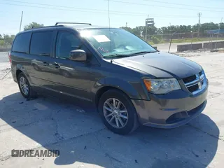 2015 Dodge Grand Caravan SXT with VIN 2C4RDGCG1FR556846, listed as a IAAI auction lot 42179172 with 120,170 mi miles and . Bid and sale history available at DreamBid. Image 1.