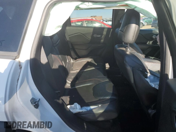 2017 Jeep Cherokee Trailhawk L Plus with VIN 1C4PJMBB3HW506965, listed as a Copart auction lot 82257594 with 106,571 mi miles and Salvage title. Bid and sale history available at DreamBid. Image 10.