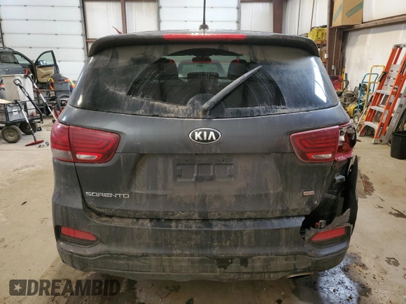 2019 Kia Sorento LX z VIN 5XYPG4A32KG548492, wystawiony jako Copart lot #61574165 z przebiegiem 134 672 mil mil oraz Szkoda całkowita • Salvage title. Historia ofert i sprzedaży dostępna na DreamBid. Obrazek 6.