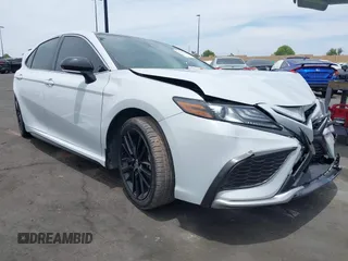 2022 Toyota Camry TRD with VIN 4T1KZ1AKXNU064790, listed as a IAAI auction lot 42359195 with 37,466 mi miles and . Bid and sale history available at DreamBid. Image 1.