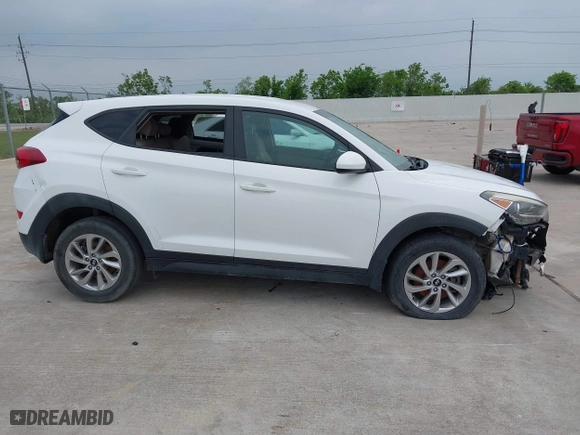 2016 Hyundai Tucson SE with VIN KM8J23A41GU232302, listed as a IAAI auction lot 42056851 with 119,159 mi miles. Bid and sale history available at carsss.com. Image 13.