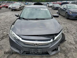 2017 Honda Civic LX z VIN 2HGFC2F56HH521264, wystawiony jako Copart lot #54561605 z przebiegiem 108 099 mil mil oraz Szkoda całkowita • Salvage title. Historia ofert i sprzedaży dostępna na DreamBid. Obrazek 5.