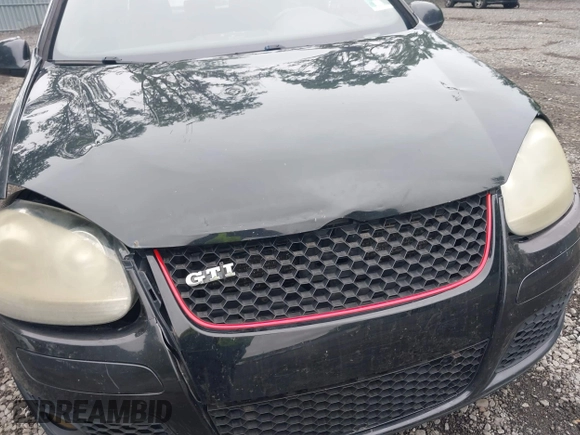 2009 Volkswagen GTI z VIN WVWED71K09W033982, wystawiony jako IAAI lot #42476732 z przebiegiem 169 250 mil mil oraz . Historia ofert i sprzedaży dostępna na DreamBid. Obrazek 6.