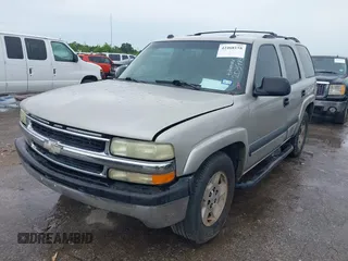 2004 Chevrolet Tahoe LT with VIN 1GNEC13Z04R203993, listed as a IAAI auction lot 42468158 with 233,657 mi miles and . Bid and sale history available at DreamBid. Image 2.