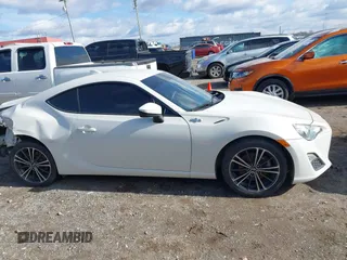 2015 Scion FR-S with VIN JF1ZNAA13F8707454, listed as a IAAI auction lot 41239233 with 130,126 mi miles. Bid and sale history available at carsss.com. Image 12.