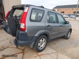 2006 Honda CR-V LX with VIN SHSRD68506U404787, listed as a IAAI auction lot 42001551 with 136,534 mi miles. Bid and sale history available at carsss.com. Image 4.
