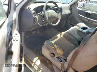 2003 Ford F-150 XL with VIN 2FTRX17213CA05950, listed as a Copart auction lot 54435115 with 310,503 mi miles and Salvage title. Bid and sale history available at DreamBid. Image 8.