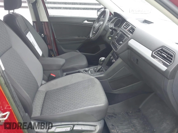 2018 Volkswagen Tiguan S with VIN 3VV0B7AX3JM095118, listed as a IAAI auction lot 42319834 with 100,759 mi miles and . Bid and sale history available at DreamBid. Image 5.