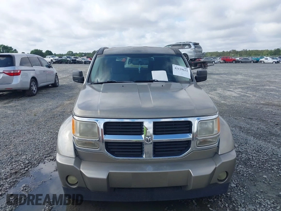 2007 Dodge Nitro SLT z VIN 1D8GT58KX7W689384, wystawiony jako IAAI lot #42139632 z przebiegiem 242 166 mil mil oraz . Historia ofert i sprzedaży dostępna na DreamBid. Obrazek 12.
