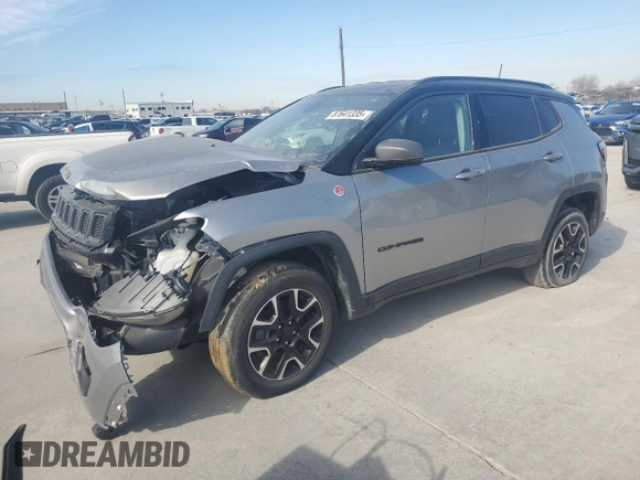 2020 Jeep Compass Trailhawk z VIN 3C4NJDDB0LT207825, wystawiony jako Copart lot #87641335 z przebiegiem Nie podano mil oraz Szkoda całkowita • Salvage title. Historia ofert i sprzedaży dostępna na DreamBid. Obrazek 1.