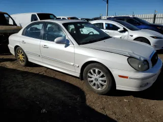 2004 Hyundai Sonata GLS with VIN KMHWF35HX4A975027, listed as a Copart auction lot 82652354 with 148,296 mi miles and Salvage Title. Bid and sale history available at carsss.com. Image 4.