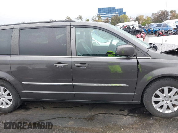 2015 Chrysler Town & Country Touring with VIN 2C4RC1BG9FR720782, listed as a IAAI auction lot 41765488 with 129,889 mi miles and . Bid and sale history available at DreamBid. Image 13.