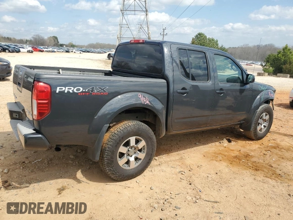2012 Nissan Frontier Pro-4X z VIN 1N6AD0EV2CC463724, wystawiony jako Copart lot #47106655 z przebiegiem 172 005 mil mil oraz Szkoda całkowita • Salvage title. Historia ofert i sprzedaży dostępna na DreamBid. Obrazek 3.