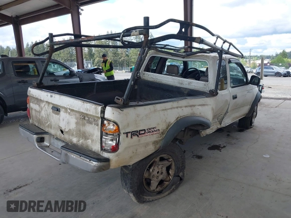 2001 Toyota Tacoma z VIN 5TEWN72N11Z733480, wystawiony jako IAAI lot #42244484 z przebiegiem 323 454 mil mil oraz . Historia ofert i sprzedaży dostępna na DreamBid. Obrazek 4.
