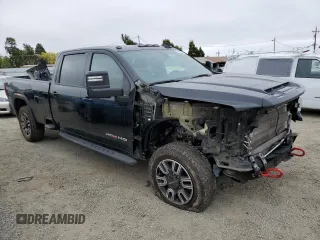 2021 GMC Sierra 3500HD AT4 z VIN 1GT49VEYXMF124749, wystawiony jako Copart lot #69328184 z przebiegiem 79 678 mil mil oraz Szkody całkowita. Historia ofert i sprzedaży dostępna na DreamBid. Obrazek 4.