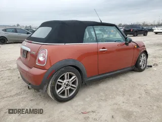 2012 MINI Convertible z VIN WMWZN3C59CT135172, wystawiony jako Copart lot #45593815 z przebiegiem 154 477 mil mil oraz Szkoda całkowita • Salvage title. Historia ofert i sprzedaży dostępna na DreamBid. Obrazek 3.