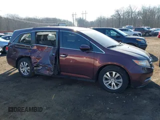 2014 Honda Odyssey EX-L with VIN 5FNRL5H60EB009083, listed as a IAAI auction lot 41633419 with 219,930 mi miles and . Bid and sale history available at carsss.com. Image 13.