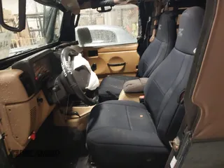 2000 Jeep Wrangler Sahara with VIN 1J4FA59S4YP788741, listed as a IAAI auction lot 41427876 with 209,434 mi miles. Bid and sale history available at carsss.com. Image 5.