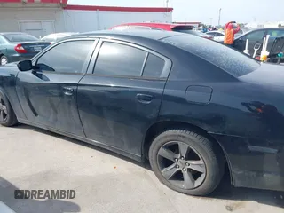 2014 Dodge Charger SE with VIN 2C3CDXBG9EH329419, listed as a IAAI auction lot 42025607 with 166,875 mi miles. Bid and sale history available at carsss.com. Image 14.