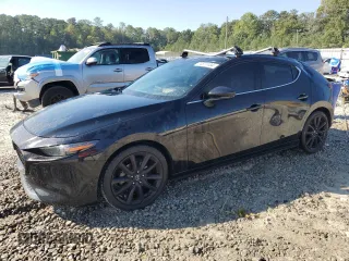 2019 Mazda Mazda3 Hatchback w/Premium Pkg with VIN JM1BPANM2K1128873, listed as a Copart auction lot 74377434 with 29,169 mi miles and Salvage Title. Bid and sale history available at carsss.com. Image 1.