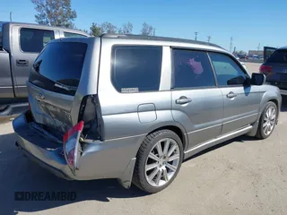 2007 Subaru Forester Sports XT with VIN JF1SG69687H733459, listed as a IAAI auction lot 41827464 with 139,943 mi miles. Bid and sale history available at carsss.com. Image 4.