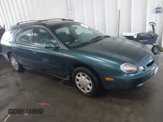 1997 Ford Taurus GL z VIN 1FALP57U2VA228703, wystawiony jako IAAI lot #41515253 z przebiegiem 94 948 mil mil oraz . Historia ofert i sprzedaży dostępna na DreamBid. Obrazek 1.