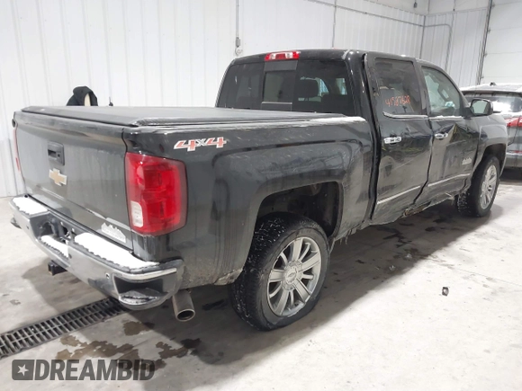 2016 Chevrolet Silverado 1500 High Country with VIN 3GCUKTEC8GG221707, listed as a IAAI auction lot 41587628 with 63,740 mi miles and . Bid and sale history available at DreamBid. Image 4.