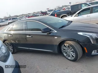 2019 Cadillac XTS Luxury with VIN 2G61M5S38K9100792, listed as a IAAI auction lot 41676187 with 103,056 mi miles and . Bid and sale history available at DreamBid. Image 13.