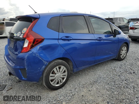 2015 Honda Fit LX with VIN 3HGGK5H50FM726275, listed as a Copart auction lot 56564315 with 123,082 mi miles and Salvage title. Bid and sale history available at DreamBid. Image 3.