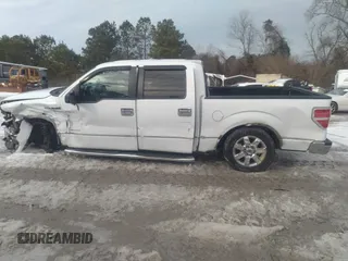 2014 Ford F-150 XL with VIN 1FTFW1CT3EKG17778, listed as a IAAI auction lot 41362619 with 122,963 mi miles. Bid and sale history available at carsss.com. Image 13.