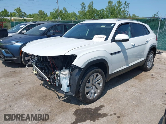 2022 Volkswagen Atlas SE z VIN 1V2HE2CA5NC225233, wystawiony jako IAAI lot #42366811 z przebiegiem 27 986 mil mil oraz . Historia ofert i sprzedaży dostępna na DreamBid. Obrazek 18.