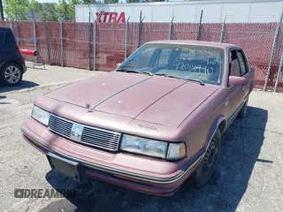 1988 Oldsmobile Cutlass Ciera with VIN 2G3AM5132J9375426, listed as a IAAI auction lot 42014990 with 292,060 mi miles and . Bid and sale history available at DreamBid. Image 6.