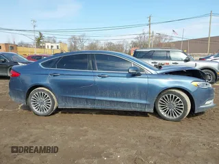 2018 Ford Fusion Titanium with VIN 3FA6P0D94JR187880, listed as a IAAI auction lot 41690869 with 120,214 mi miles and . Bid and sale history available at DreamBid. Image 13.