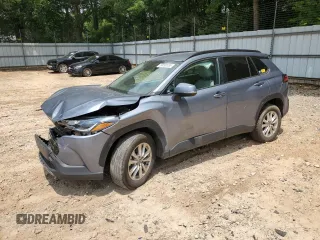 2022 Toyota Corolla Cross LE with VIN 7MUCAAAG8NV017408, listed as a Copart auction lot 59096555 with 33,703 mi miles and Salvage title. Bid and sale history available at DreamBid. Image 1.