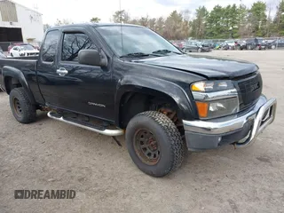 2005 GMC Canyon SLE Z85 with VIN 1GTDT196958206061, listed as a IAAI auction lot 42121015 with 158,440 mi miles. Bid and sale history available at carsss.com. Image 1.