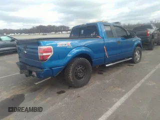2009 Ford F-150 STX with VIN 1FTRX14849FA11909, listed as a IAAI auction lot 40979039 with 162,013 mi miles. Bid and sale history available at carsss.com. Image 4.