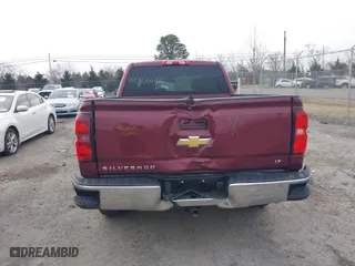 2014 Chevrolet Silverado 1500 LT with VIN 3GCUKREC0EG293503, listed as a IAAI auction lot 41536590 with 140,865 mi miles. Bid and sale history available at carsss.com. Image 6.