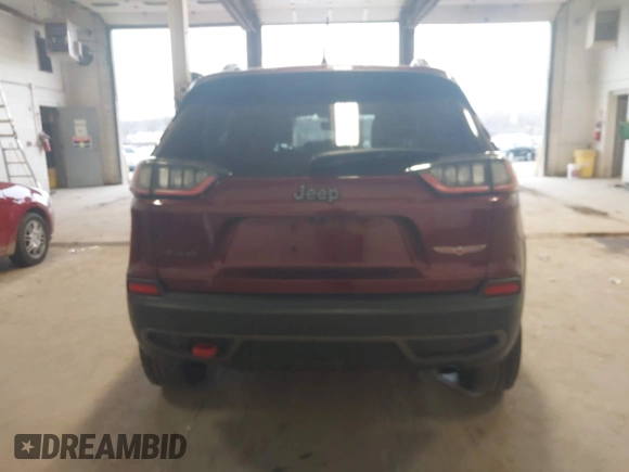 2019 Jeep Cherokee Trailhawk z VIN 1C4PJMBX0KD361981, wystawiony jako IAAI lot #42074093 z przebiegiem 56 989 mil mil oraz . Historia ofert i sprzedaży dostępna na DreamBid. Obrazek 16.