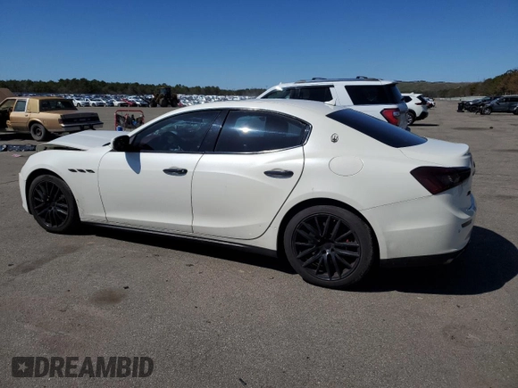 2017 Maserati Ghibli S Q4 z VIN ZAM57RTA6H1247079, wystawiony jako Copart lot #52099755 z przebiegiem 124 159 mil mil oraz Szkody całkowita. Historia ofert i sprzedaży dostępna na DreamBid. Obrazek 2.
