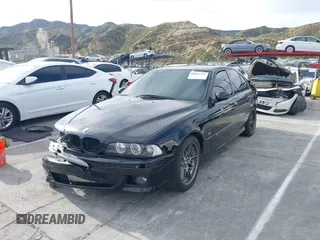 2001 BMW M5 z VIN WBSDE93421BZ99483, wystawiony jako IAAI lot #41892842 z przebiegiem 134 689 mil mil oraz . Historia ofert i sprzedaży dostępna na DreamBid. Obrazek 2.