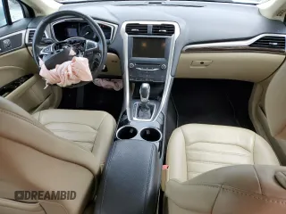 2013 Ford Fusion SE Hybrid z VIN 3FA6P0LU6DR174719, wystawiony jako Copart lot #62877715 z przebiegiem 52 884 mil mil oraz Szkoda całkowita • Salvage title. Historia ofert i sprzedaży dostępna na DreamBid. Obrazek 8.